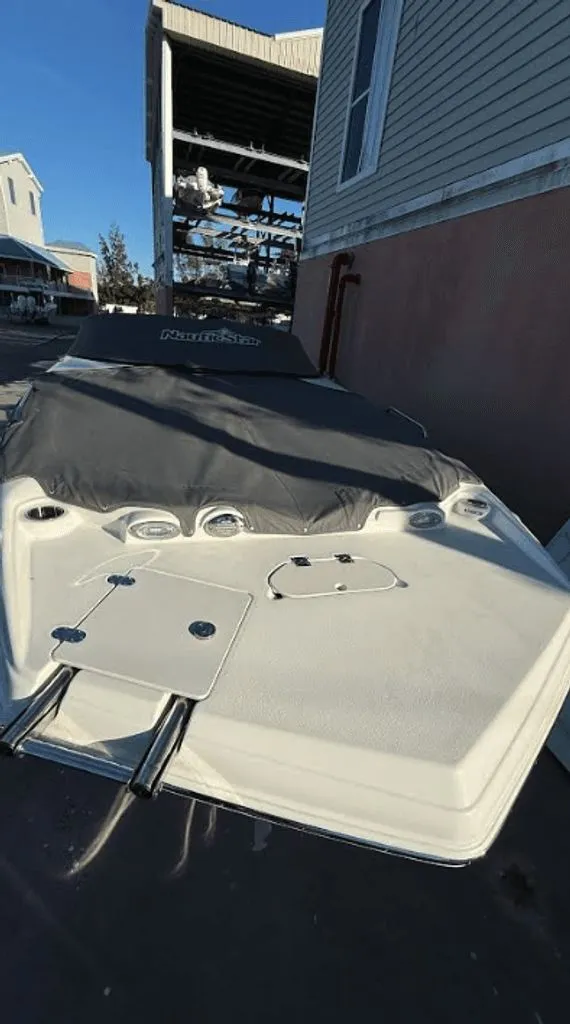 Slide: The Image of NauticStar 243 DC Sport Deck DB 2023 - 18