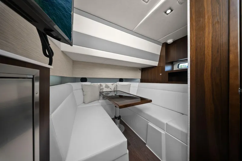 Slide: The Image of Luxurious interior of 2026 Cruisers Yachts 42 GLS OB with elegant seating and modern design. - 27