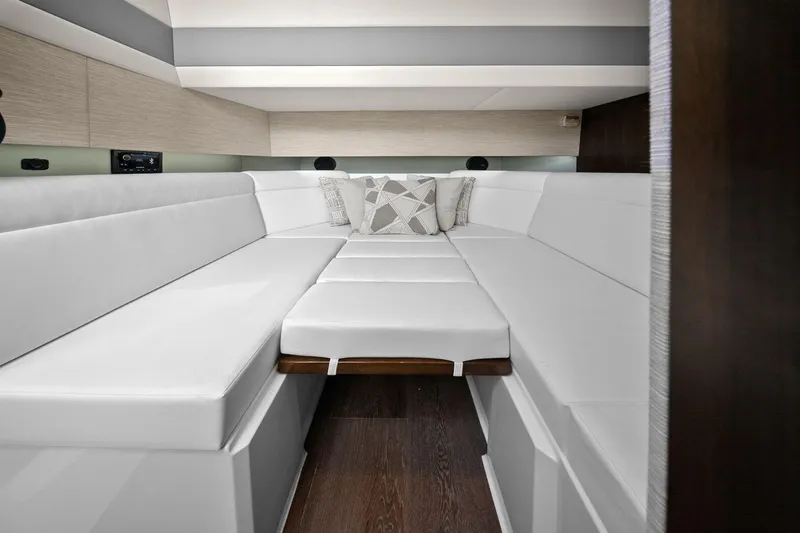Slide: The Image of Luxurious interior of 2026 Cruisers Yachts 42 GLS OB with white seating and modern design. - 28