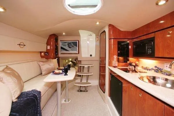 Slide: The Image of Luxurious interior of 2009 Fountain 38 Express Cruiser with modern amenities and elegant design. - 22