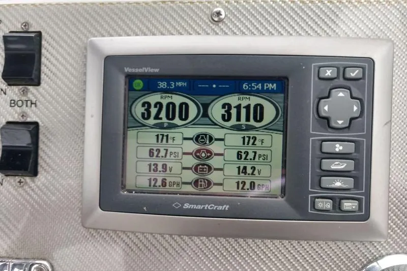 Slide: The Image of SmartCraft VesselView display on 2009 Fountain 38 Express Cruiser showing engine metrics. - 7