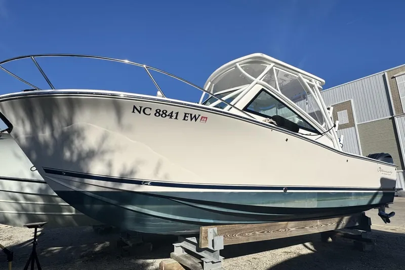 The Image of 2022 Albemarle 25 Express boat on calm blue water, side view. - 0