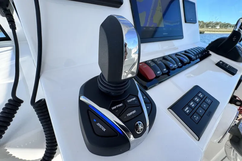 Slide: The Image of Control panel of 2022 Albemarle 25 Express boat with joystick and navigation screen. - 31