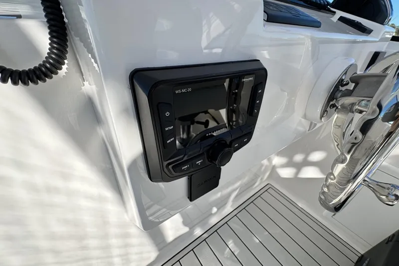 Slide: The Image of Control panel of 2022 Albemarle 25 Express boat with steering wheel and display. - 33