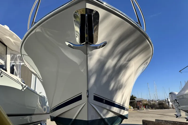 Slide: The Image of 2022 Albemarle 25 Express boat with dual engines on calm water. - 5