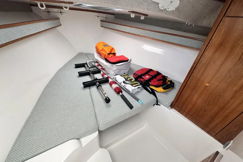 Slide: The Image of 2022 Albemarle 25 Express boat cruising on open water with twin Yamaha engines. - 8