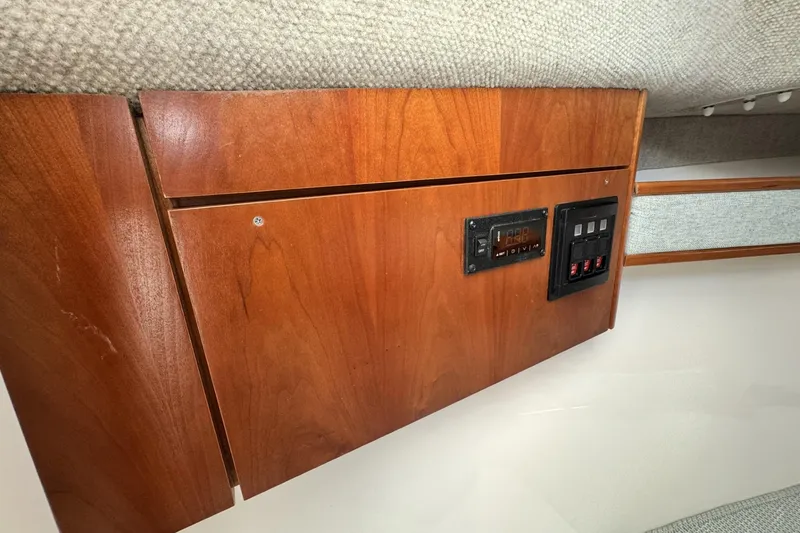 Slide: The Image of 2022 Albemarle 25 Express boat cruising on sparkling water. - 9