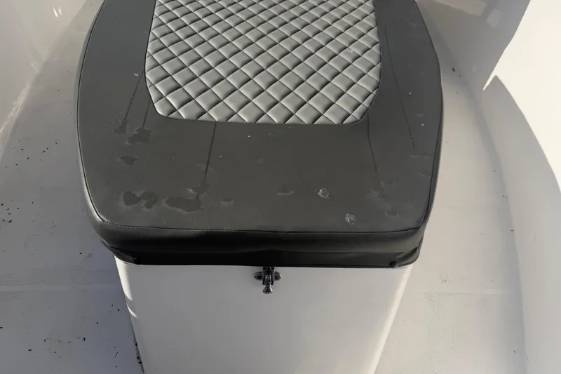 Slide: The Image of 2024 Clearwater 2800 boat seat with diamond-patterned upholstery. - 20