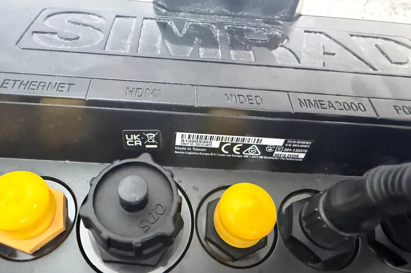 Slide: The Image of Close-up of a Simrad device with various ports and connectors, Clearwater 2800, 2024 model. - 22