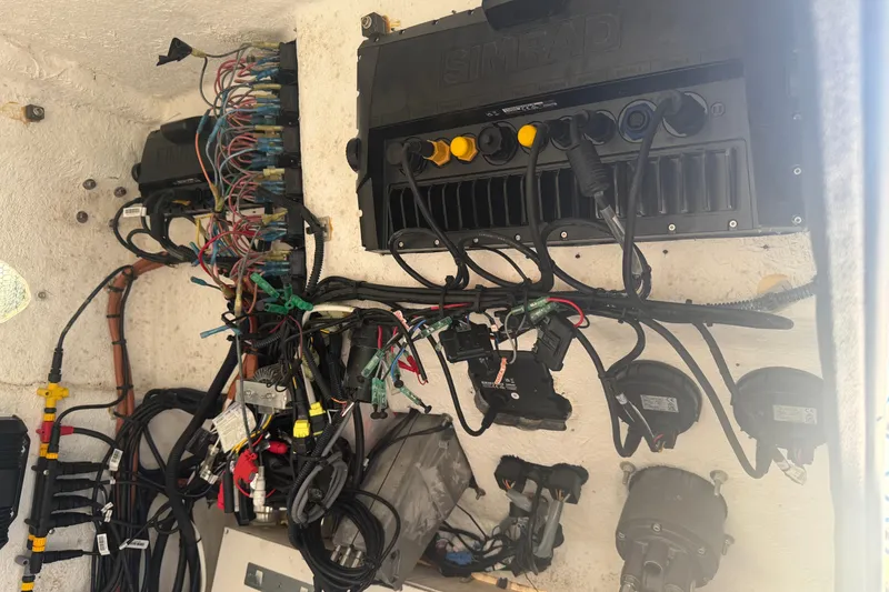Slide: The Image of 2024 Clearwater 2800 boat wiring and electronics setup with Simrad equipment. - 26