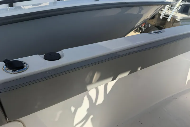 Slide: The Image of 2024 Clearwater 2800 boat deck detail with sleek design and modern fittings. - 42