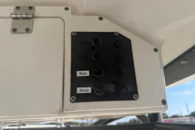 Slide: The Image of Control panel on 2024 Clearwater 2800 boat with labeled bow and stern switches. - 46