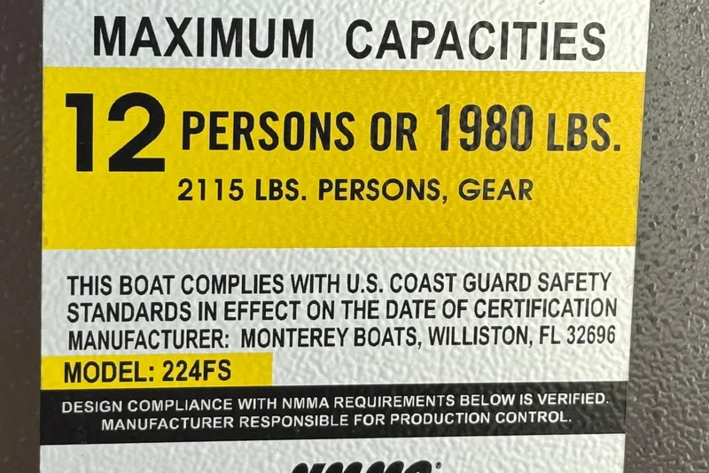 Slide: The Image of 2019 Monterey 224FS boat capacity label, 12 persons or 1980 lbs, USCG compliant. - 31