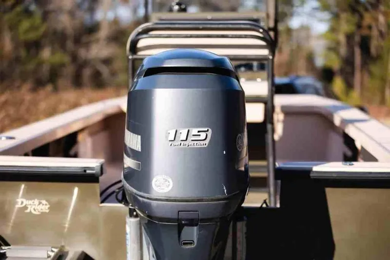 Slide: The Image of Bay Rider 2060 boat with Yamaha 115 engine, 2015 model, outdoor setting. - 10