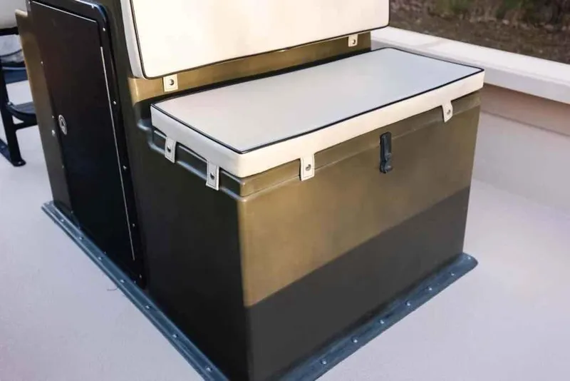 Slide: The Image of Bay Rider 2060 boat seat with storage, 2015 model, featuring cushioned seating. - 22