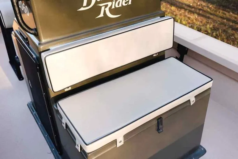 Slide: The Image of Bay Rider 2060 boat seat and storage, 2015 model, featuring cushioned seating and durable design. - 23