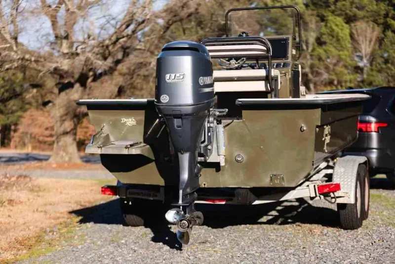 Slide: The Image of 2015 Bay Rider 2060 boat with Yamaha outboard motor on a trailer. - 7