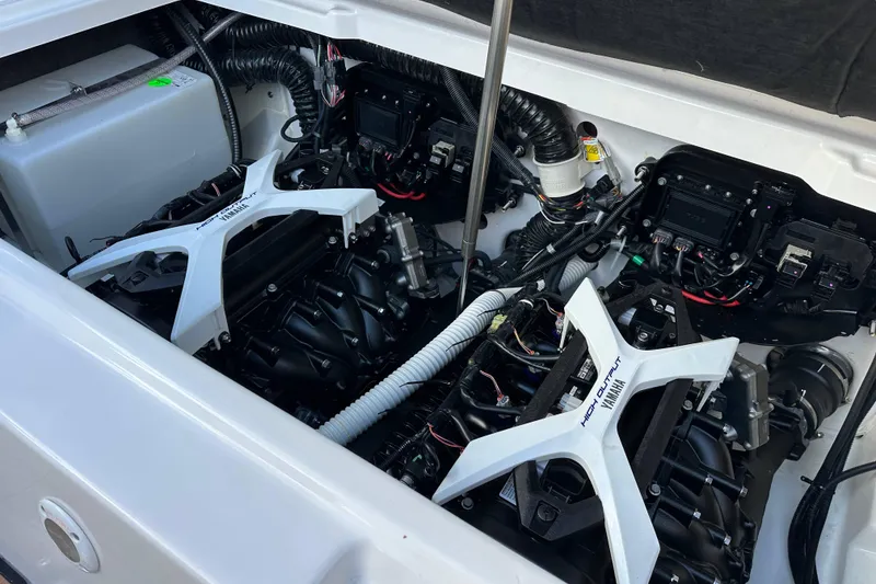 Slide: The Image of 2024 Yamaha Boats 252SE engine compartment showcasing dual high-output engines. - 19