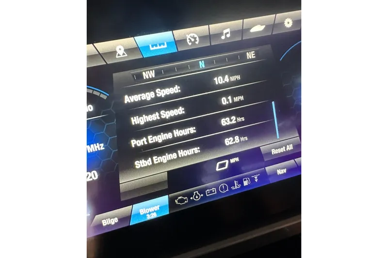 Slide: The Image of 2024 Yamaha Boats 252SE in marina, showcasing sleek design and luxurious seating. - 2