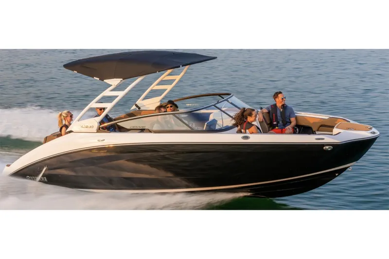 Slide: The Image of 2024 Yamaha Boats 252SE interior with brown seating and wood-style flooring. - 4