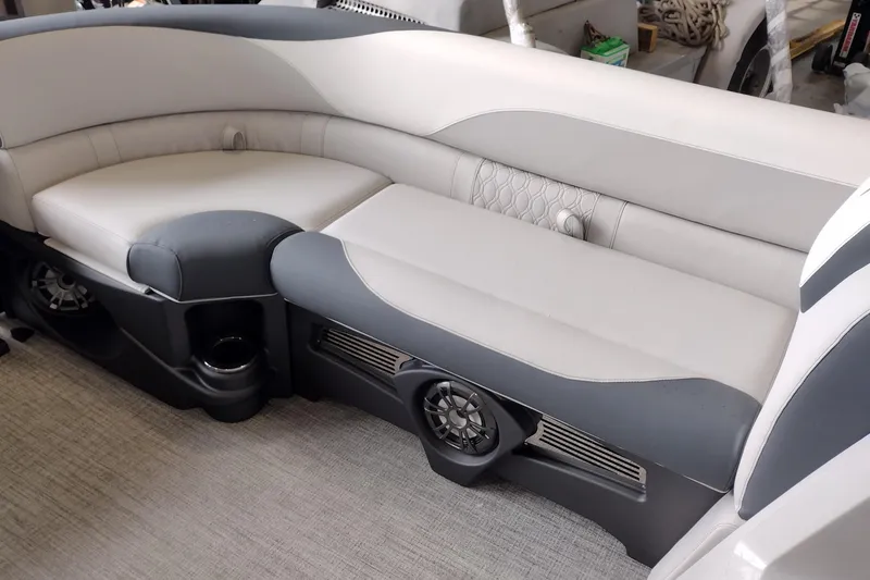 Slide: The Image of 2026 Tahoe Pontoon 25E85 LTZ Rear Bench with sleek, modern seating and integrated speakers. - 133