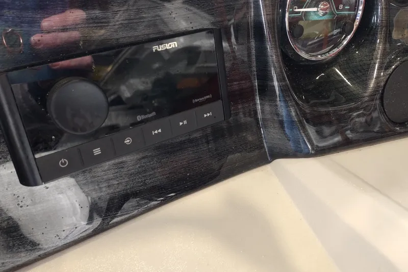 Slide: The Image of Dashboard of 2026 Tahoe Pontoon 25E85 LTZ with Fusion audio system. - 137