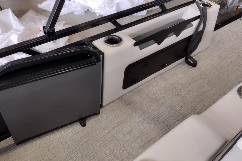 Slide: The Image of 2026 Tahoe Pontoon 25E85 LTZ Rear Bench interior with sleek design and storage features. - 148