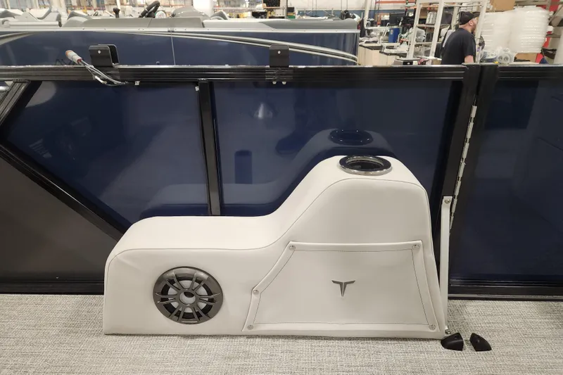 Slide: The Image of 2026 Tahoe Pontoon 25E85 LTZ Rear Bench captain's seat wrapped in protective plastic. - 15