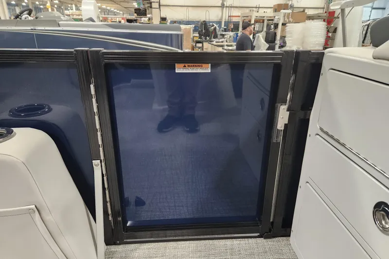 Slide: The Image of 2026 Tahoe Pontoon 25E85 LTZ Rear Bench with sleek, modern seating and cup holders. - 17