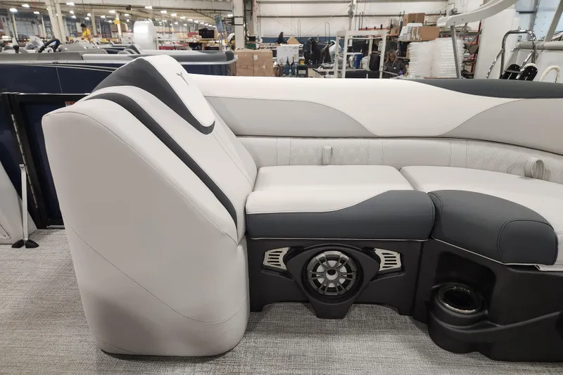 Slide: The Image of 2026 Tahoe Pontoon 25E85 LTZ Rear Bench with sleek seating and cup holders. - 20
