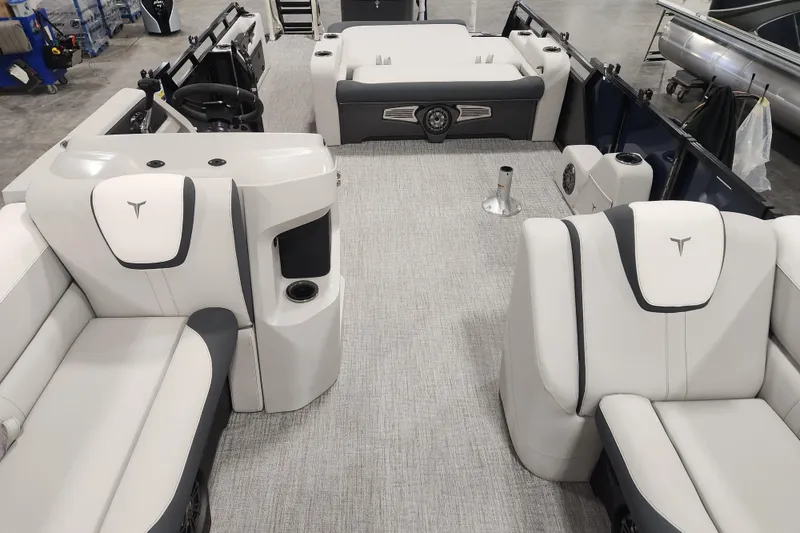 Slide: The Image of 2026 Tahoe Pontoon 25E85 LTZ Rear Bench with cup holders and sleek seating design. - 22