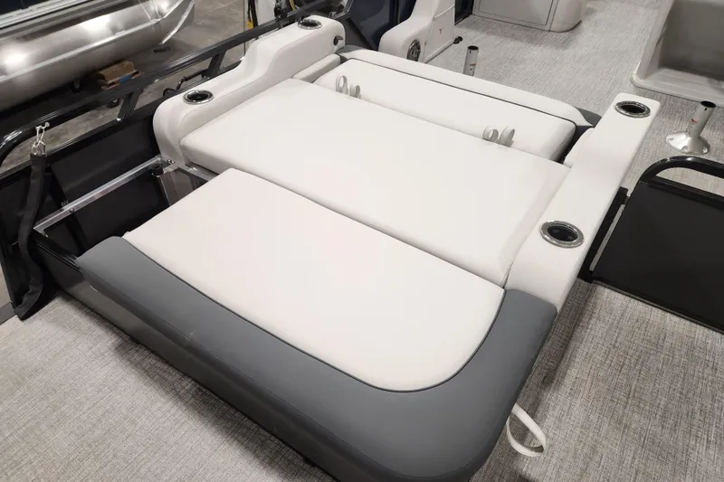 Slide: The Image of 2026 Tahoe Pontoon 25E85 LTZ Rear Bench interior with storage drawers and seating. - 23