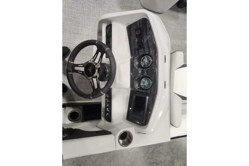 Slide: The Image of 2026 Tahoe Pontoon 23 LTZ Rear Bench with sleek design in a showroom setting. - 43