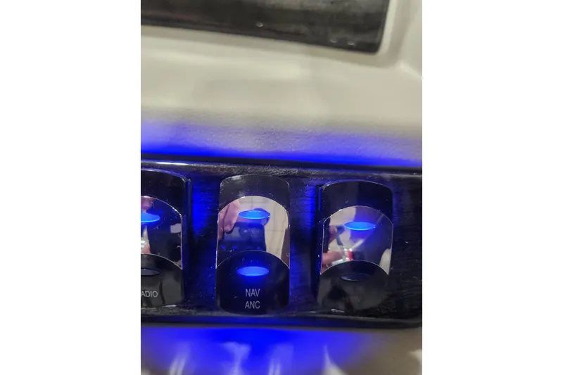 Slide: The Image of 2026 Tahoe Pontoon 23 LTZ Rear Bench, sleek design in a showroom setting. - 46