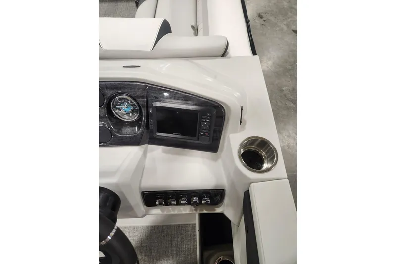 Slide: The Image of 2026 Tahoe Pontoon 23 LTZ Rear Bench, blue exterior, indoor showroom display. - 47