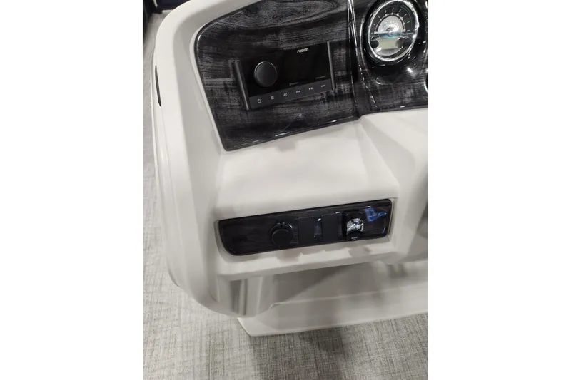 Slide: The Image of 2026 Tahoe Pontoon 23 LTZ Rear Bench, Platinum Edition, sleek design in showroom. - 49