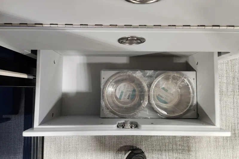 Slide: The Image of 2026 Tahoe Pontoon 23 LTZ Rear Bench layout with seating and helm design. - 55