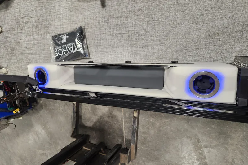 Slide: The Image of 2026 Tahoe Pontoon 23 LTZ Rear Bench, close-up of pontoon undercarriage. - 56