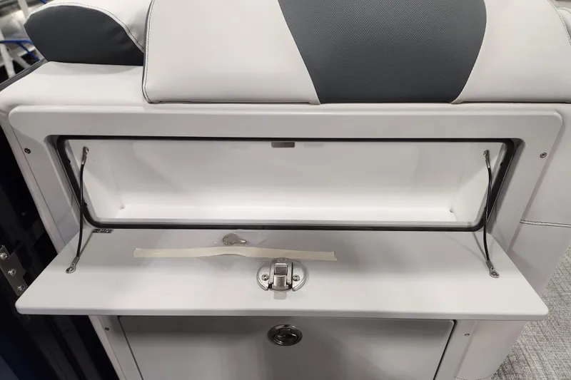 Slide: The Image of 2026 Tahoe Pontoon 23 LTZ Rear Bench with sleek white and gray upholstery. - 63