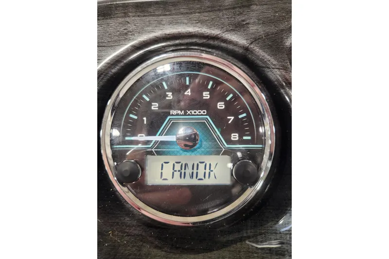 Slide: The Image of 2026 Tahoe Pontoon 23 LTZ Rear Bench in a spacious indoor showroom. - 64