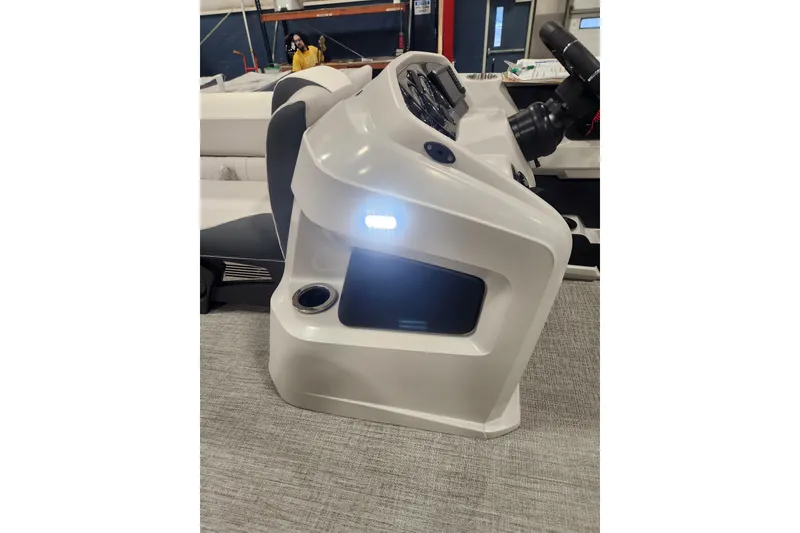 Slide: The Image of 2026 Tahoe Pontoon 23 LTZ Rear Bench with integrated speakers and cup holders. - 66