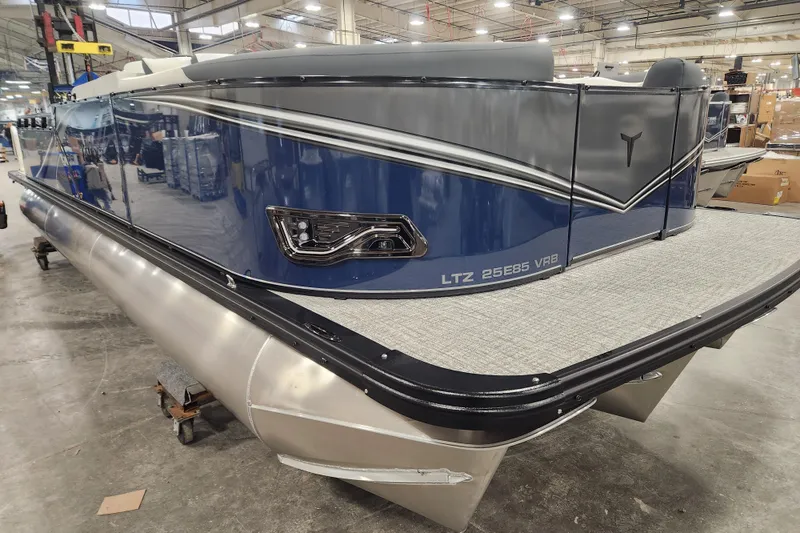 Slide: The Image of 2026 Tahoe Pontoon 25E85 LTZ Rear Bench, Platinum Edition, sleek design detail. - 8