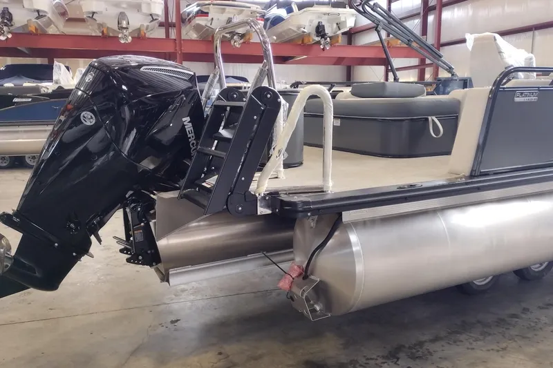 Slide: The Image of 2026 Tahoe Pontoon 23 LTZ Rear Bench interior with sleek seating and speaker system. - 83