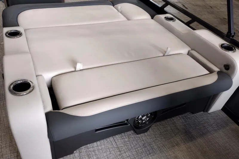 Slide: The Image of 2026 Tahoe Pontoon 23 LTZ Rear Bench dashboard with steering wheel and controls. - 99