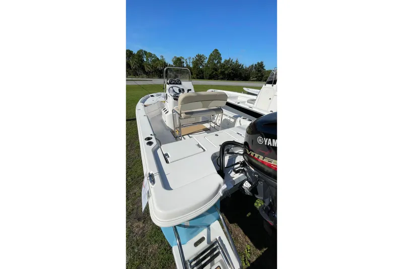 Slide: The Image of 2022 NauticStar 195 XTS boat fuel cap with safety warnings and pressure test label. - 12