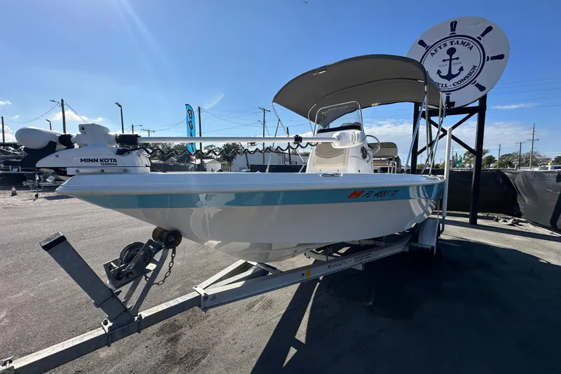 Slide: The Image of 2022 NauticStar 195 XTS boat on trailer with Minn Kota Terrova motor. - 14