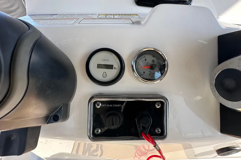 Slide: The Image of Dashboard of 2022 NauticStar 195 XTS boat with Yamaha gauges and controls. - 26