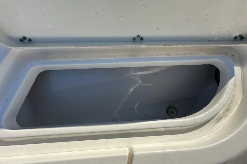 Slide: The Image of Livewell compartment in 2022 NauticStar 195 XTS boat, open and empty. - 50