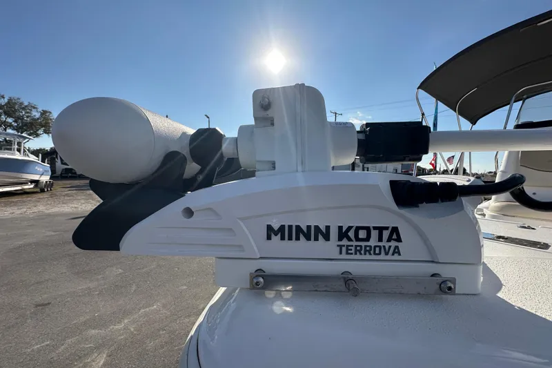 Slide: The Image of Minn Kota Terrova motor on 2022 NauticStar 195 XTS boat, sunny day background. - 58