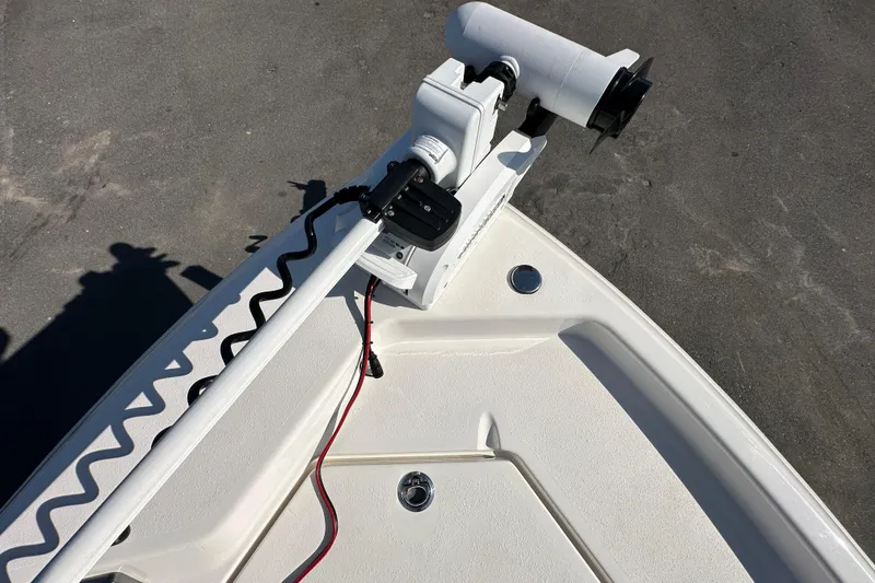 Slide: The Image of 2022 NauticStar 195 XTS boat bow with trolling motor on deck. - 62